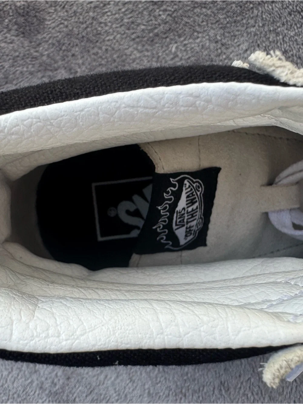 Vans Unisex Black and White High-Top Sneakers with Flame Accent